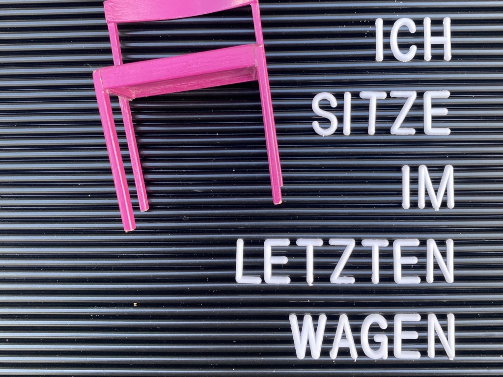 Ich sitze im letzten Wagen